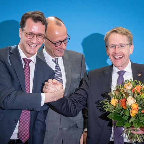 Hendrik Wüst, Friedrich Merz und Daniel Günther nach Wahlsieg in  Schleswig-Holstein