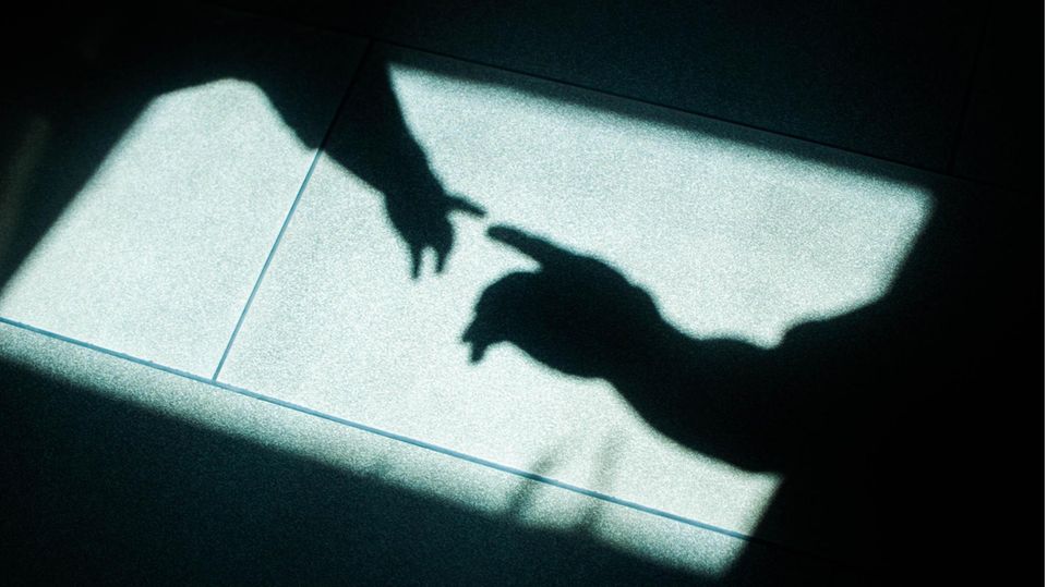 Schatten von zwei Händen