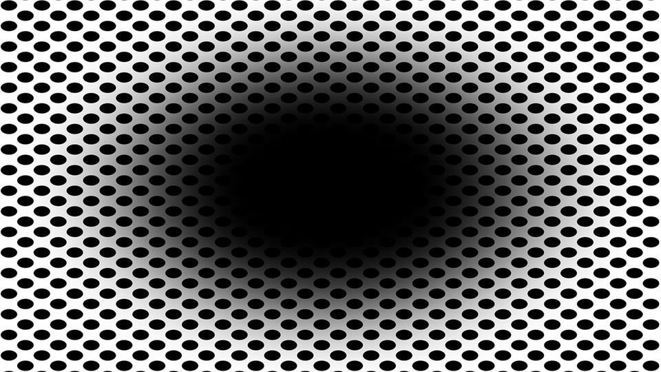 Optische Illusion: Schwarzes Loch in der Mitte umrundet von kleinen schwarzen Punkten