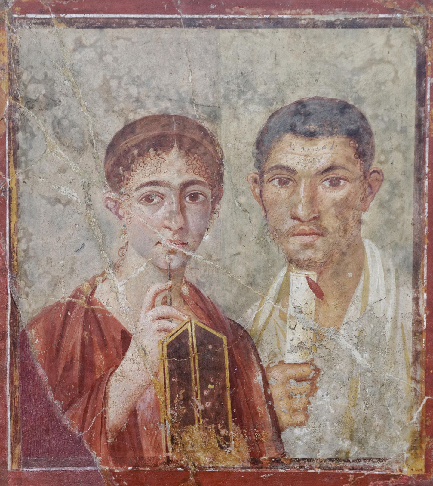 Das Paar zeigt sich mit den Insignien gute Römer - sie betont ihre Bildung und ihre Rolle im Geschäft.