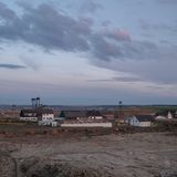 Ein Ort verblast: Blick auf die letzten Häuser von Borschemich. Die direkten Nachbarorte Holz, Otzenrath und Spenrath sind längst verschwunden