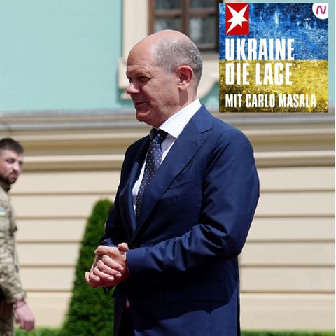 Ukraines Präsident Wolodymyr Selenskyj (l) und Bundeskanzler Olaf Scholz (r)