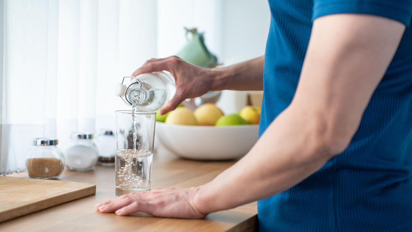1. Drink a lot Man pours water