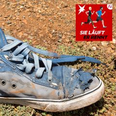 Eine kaputter Sportschuh