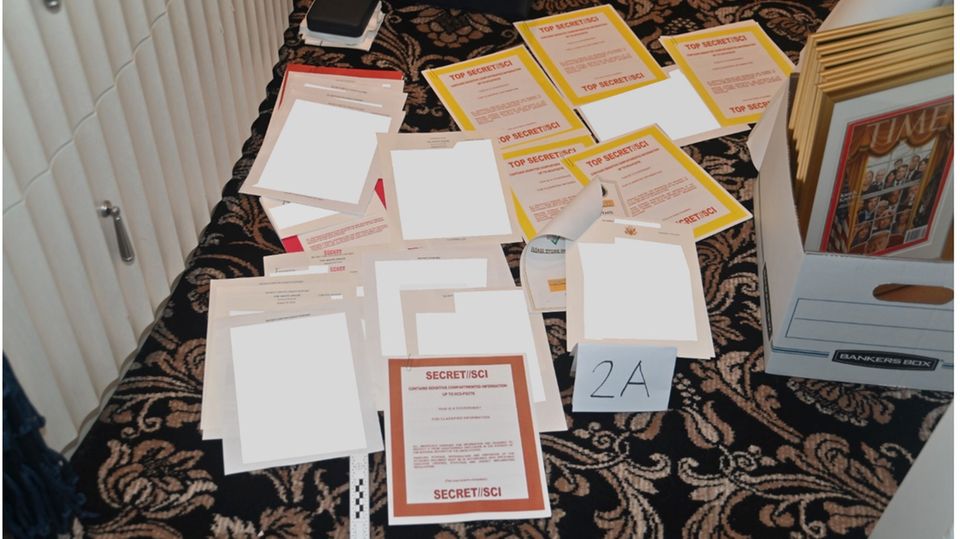 This photo released by the US Department of Justice shows classified documents confiscated at Donald Trump's Mar-a-Lago estate This photo released by the US Department of Justice shows classified documents confiscated at Donald Trump's Mar-a-Lago estate