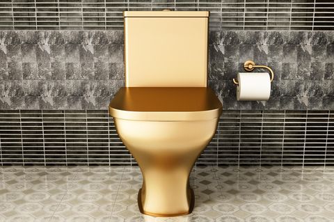 Goldene morderne Toilette