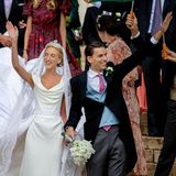 Prinzessin Maria Laura von Belgien und ihr Mann William Isvy winken ihren Hochzeitsgästen