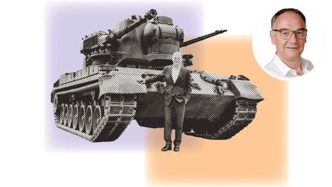 Bundeskanzler Olaf Scholz steht vor einem Gepard Panzer