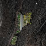 Eine durch einen Vulkanausbruch zerstörte Straße