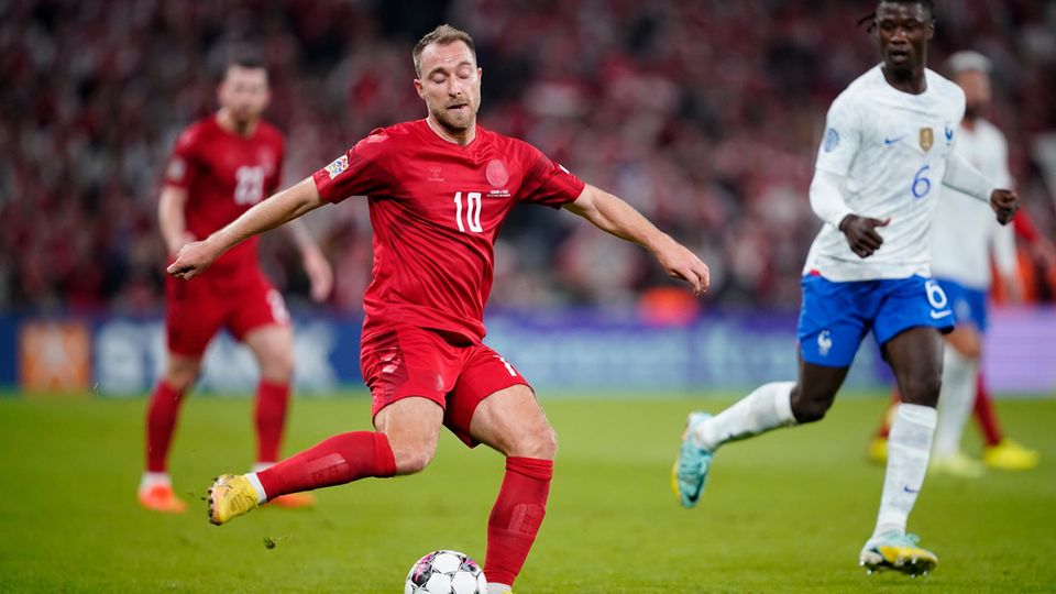 Denmark's Christian Eriksen still wears the old jersey in the Nations League.  Then there's the new one in Qatar.