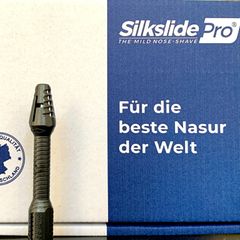 Der Silkslide Pro aus DHDL steht vor seiner Verpackung