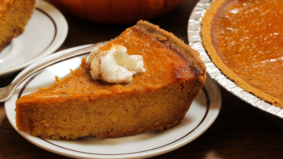 Pumpkin Spice Latte Starbucks Pumpkin Pie A slice of pumpkin pie on a plate