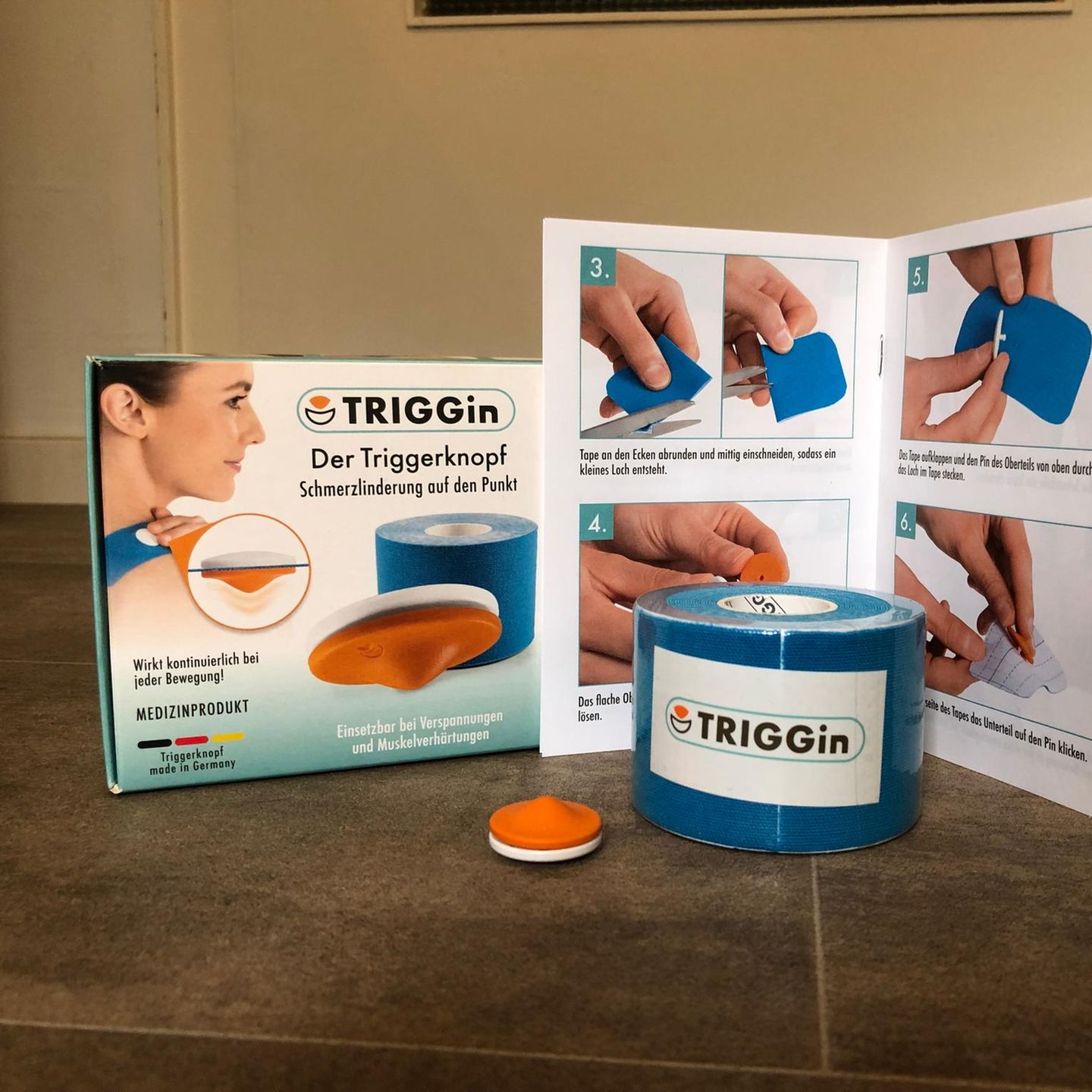 Triggid aus DHDL: Lieferumfang mit Kinesiotape, Triggerknopf und Anleitung