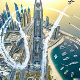 Fliegende Autos in Dubai? Dall-E hat damit keine Probleme.  Die Bildbeschreibung: "A photo of flying cars in Dubai, high quality"