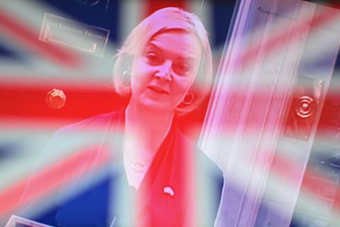 Liz Truss fades away behind the Union Jack