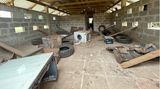 Auf dem Trainingsgelände in Morogoro in Tansania wurde mit verschiedenen Hindernissen ein eingestürztes Gebäude nachgestellt.