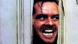 Jack Nicholson schaut durch ein Loch in der Tür