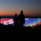 Sonnenuntergang und Allianz-Arena leuchten um die Wette