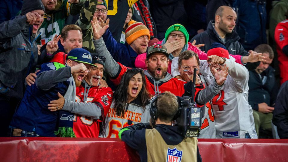 NFL fans at the Allianz Arena celebrate during the game between Tampa Bay and Seattle