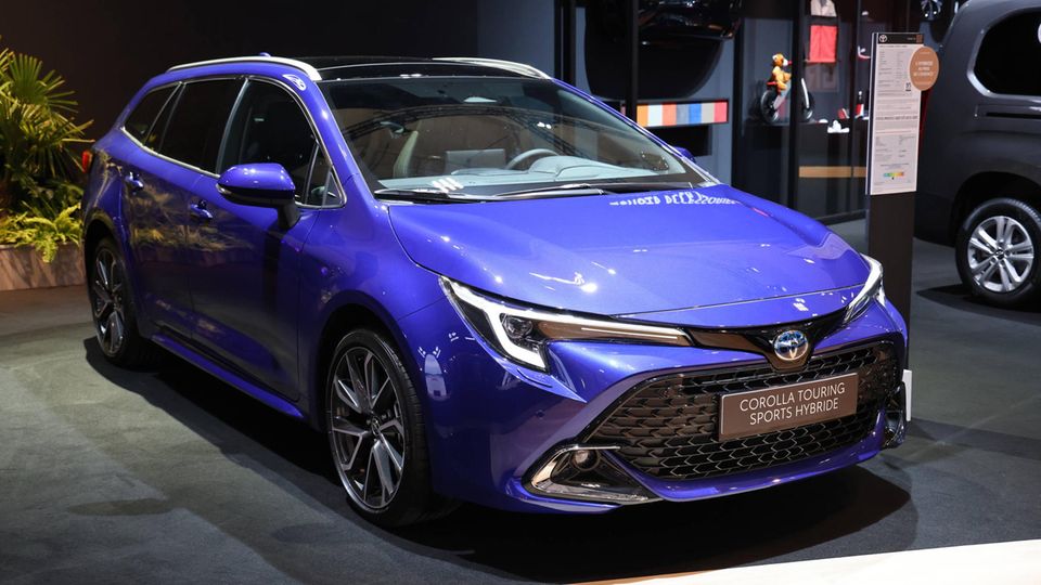 Afghanistan: No sports car: a Toyota Corolla at a trade fair. Not a sports car: a Toyota Corolla at a trade fair.