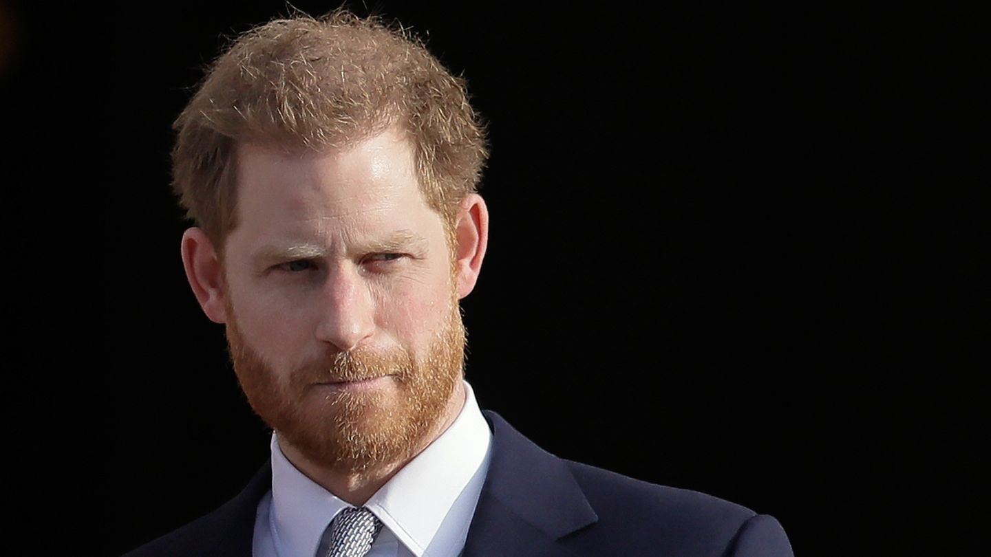 Prince Harry sits with the royal family at Charles’ coronation