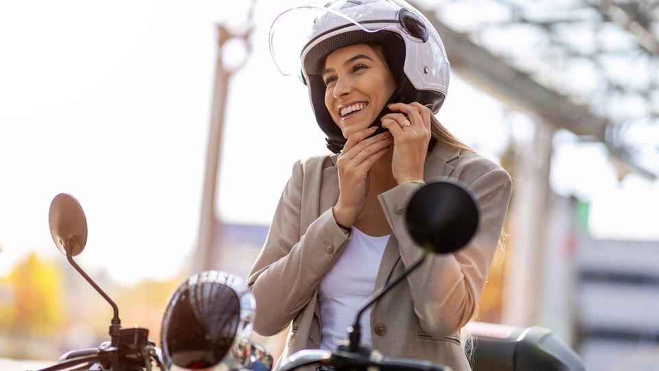 Driving license: woman on motorcycle