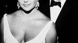 Elizabeth Taylor, hier bei den Oscars 1960 in Begleitung von Ehemann Nummer vier, Eddie Fisher