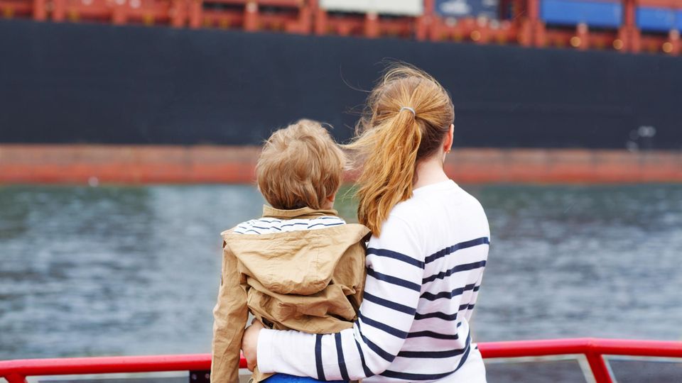 Woman with child on a ferry in Hamburg