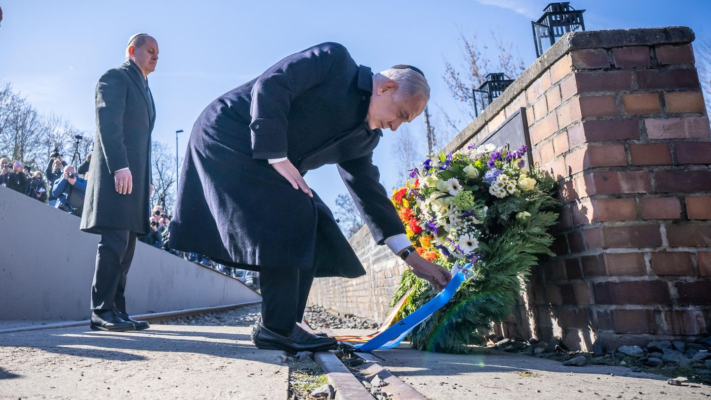 Benjamin Netanjahu in Berlin, im Hintergrund Olaf Scholz