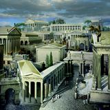 Die Ostseite des Forums mit Blick auf das Kapitol im Westen. Im Vordergrund ist der Bogen des Fabius, die Regia, der Bogen für Gaius und Lucius Caesar und der Tempel des Antonius Pius und der Faustina zu sehen (von links nach rechts). 