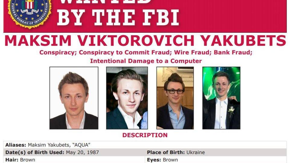 Ein Fahndungsplakat mit Hacker Maksim Yakubets