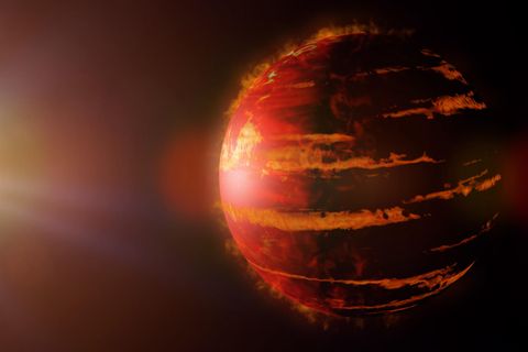 Roter Exoplanet im Weltall (Symbolbild)