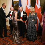 CDU-Parteichef Friedrich Merz und Ehefrau Charlotte begrüßen das Königspaar.