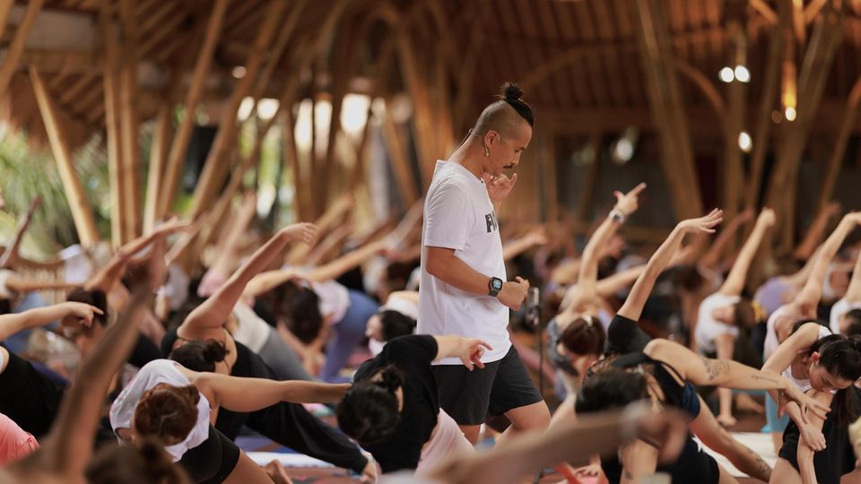 Inside Yoga founder Young Ho Kim during a yoga class