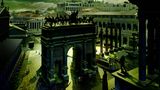 Blick vom Kapitol über das Forum Romanum, in der Bildmitte die Westseite des Bogens des Septimius Severus. Am 9. April 193 n. Chr. war der Statthalter der Provinz Oberpannonien (der westliche Teil des heutigen Ungarns) Septimius Severus zum Kaiser ausgerufen worden. Der Bogen, der seinen Namen trägt, wurde 202 oder 204 n. Chr. eingeweiht und feierte neben den Eroberungen des Kaisers im Osten ganz allgemein seine Herrschaft. In der Spätantike und im Frühmittelalter entfernte man die Statuen von der Attika. Ansonsten blieb der Bogen unbeachtet. 