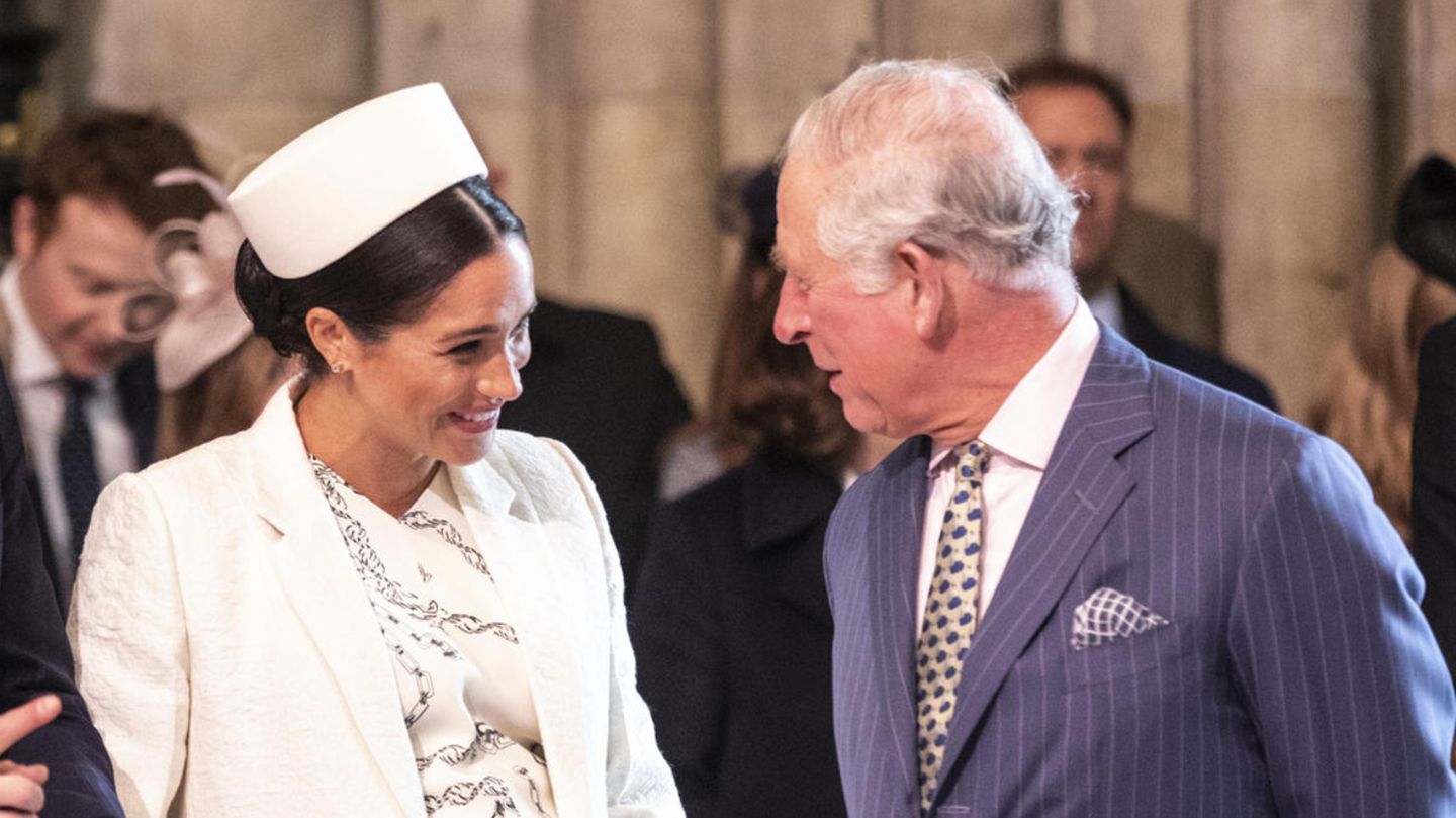 Herzogin Meghan und der heutige König Charles (rechts im Bild)