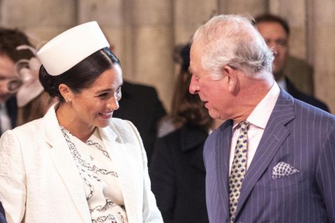 Herzogin Meghan und der heutige König Charles (rechts im Bild)