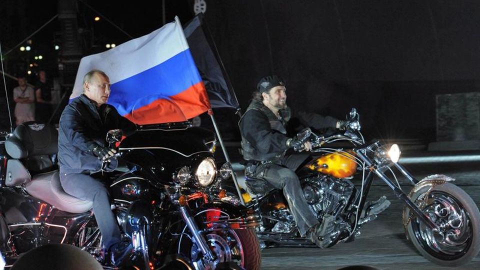 Kremlin chief Vladimir Putin and Alexander Zaldostanov ride a motorcycle together