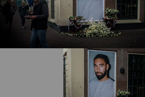 Hausecke mit einem Foto von Djordy und Kerzen davor