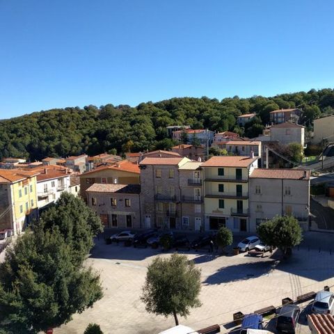 A square with a row of houses in Ollolai on Sardinia