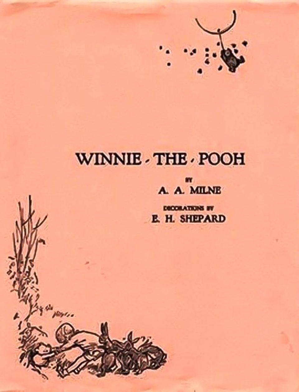 Eine alte Ausgabe von Winnie The Pooh mit orangefarbenem Cover