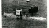 Der Schweizer Physiker Auguste Piccard konstruierte dieses Bathyscaph genannte Tauchboot, welches 1953 in Italien vom Stapel gelassen wurde. Das Wort Bathyscaph setzt sich aus den griechischen Wörtern "bathos" für tief und "skaphos" für Schiff zusammen. Noch im selben Jahr unternahm er mit seinem Sohn Jacques – der mit der "Trieste" ein paar Jahre später noch einen Rekord aufstellen sollte – die ersten Tauchgänge. Ende August erreichten die Beiden vor Capri eine Tiefe von 1100 Metern. Ende September gelang es ihnen, im Tyrrhenischen Meer 3150 Meter tief zu tauchen. Der Großteil des Unterwasserfahrzeugs bestand aus dem gut 15 Meter langem Auftriebskörper. Darunter hing eine Stahlkugel für Passagiere. 
