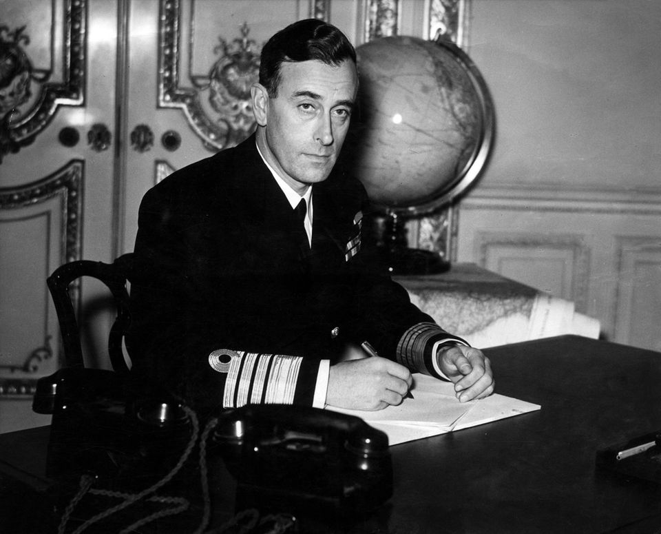 Lord Louis Mountbatten at the desk, Prince Charles' beloved great uncle