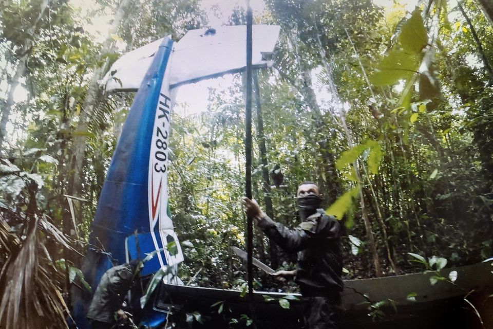 A solider near the site of the crashed plane