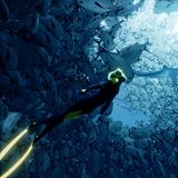 Videspielgrafik: Ein Taucher unter Haien