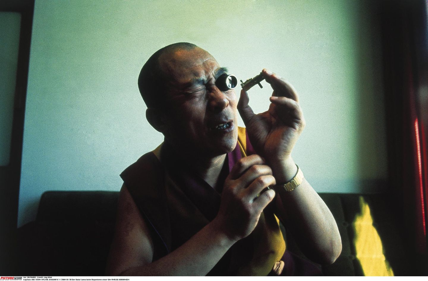 Gottheit mit Vergrößerungsglas Dalai Lama