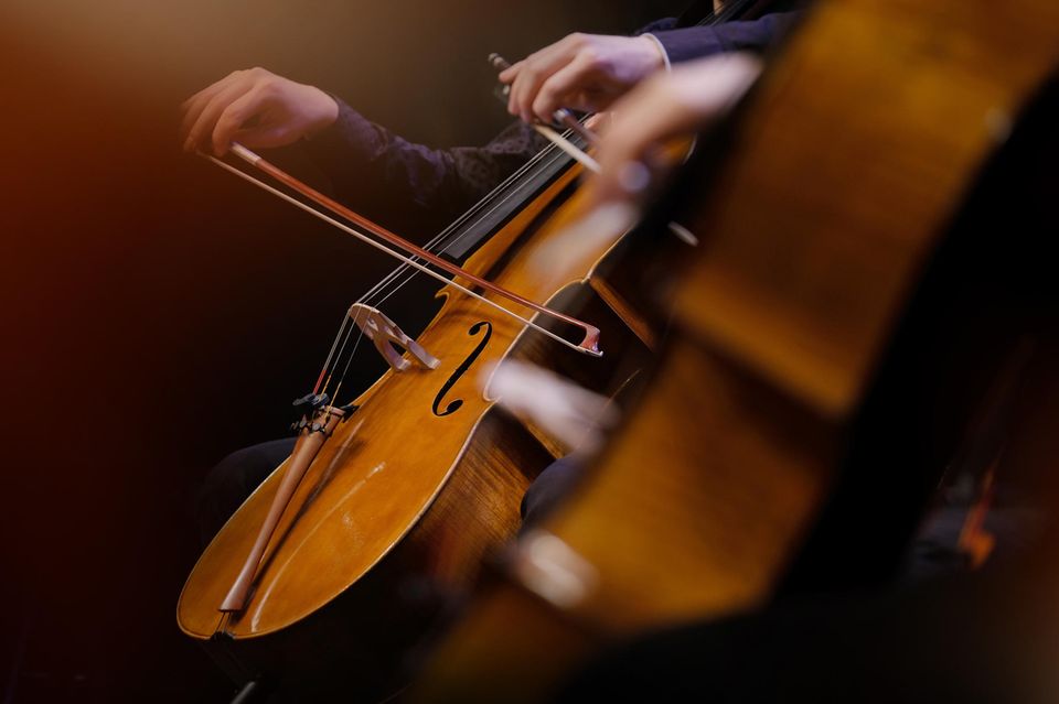 A woman plays cello