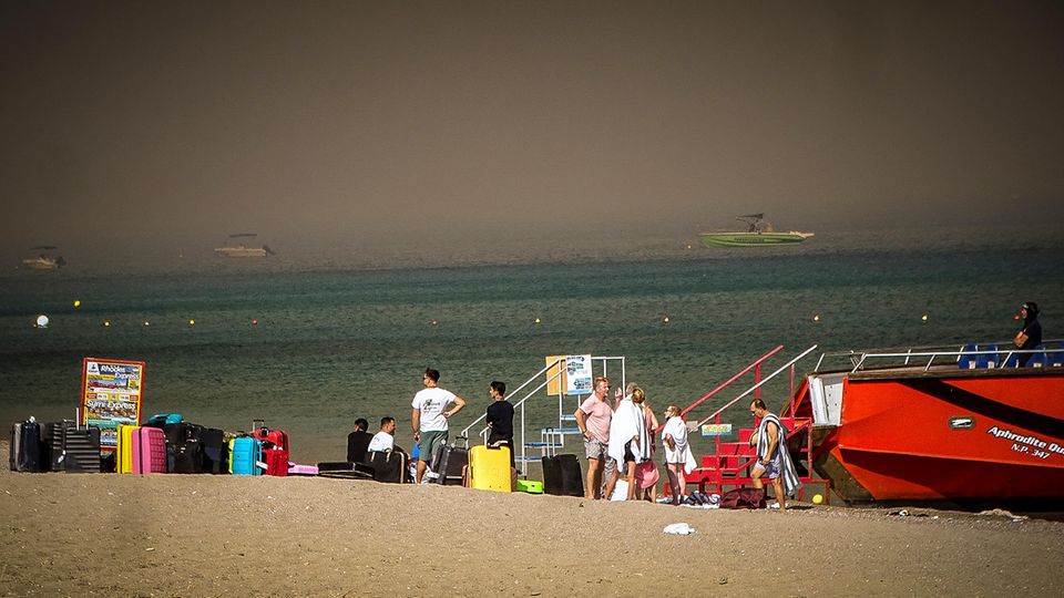 Touristen am Strand