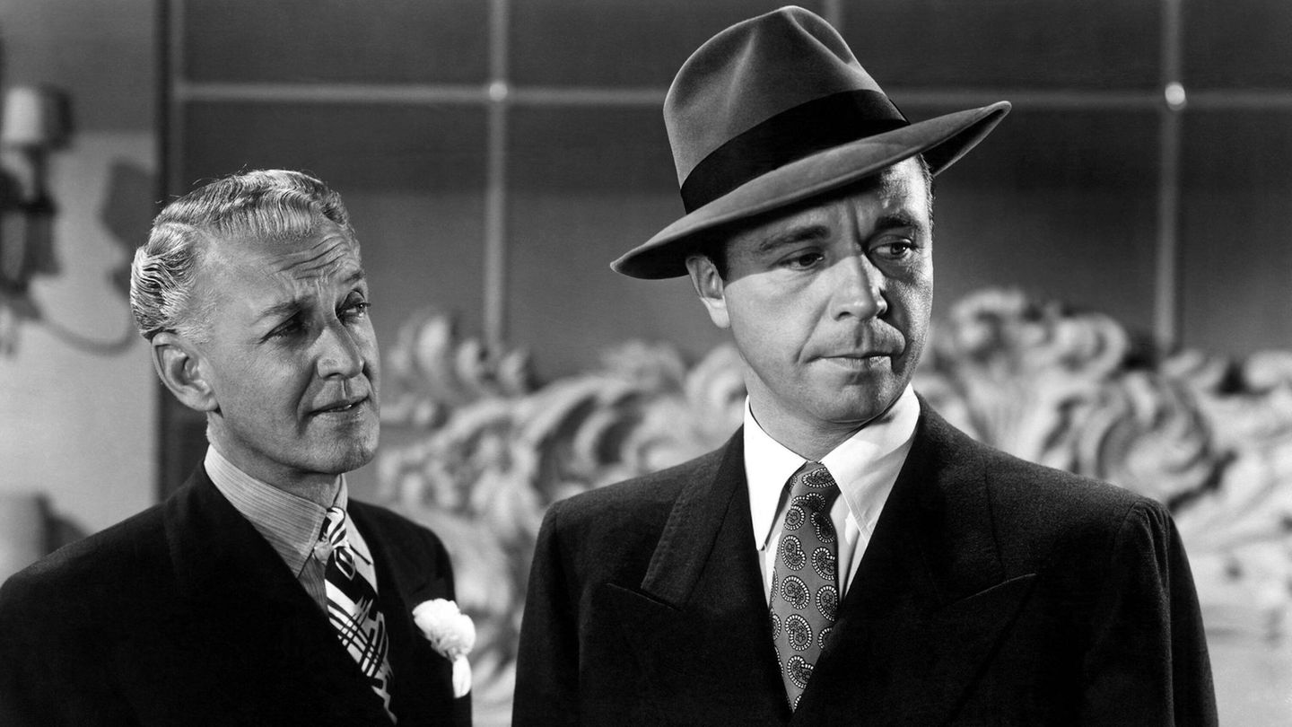 Philip Marlowe: Zwei Männer stehen nebeneinander, einer trägt einen Hut