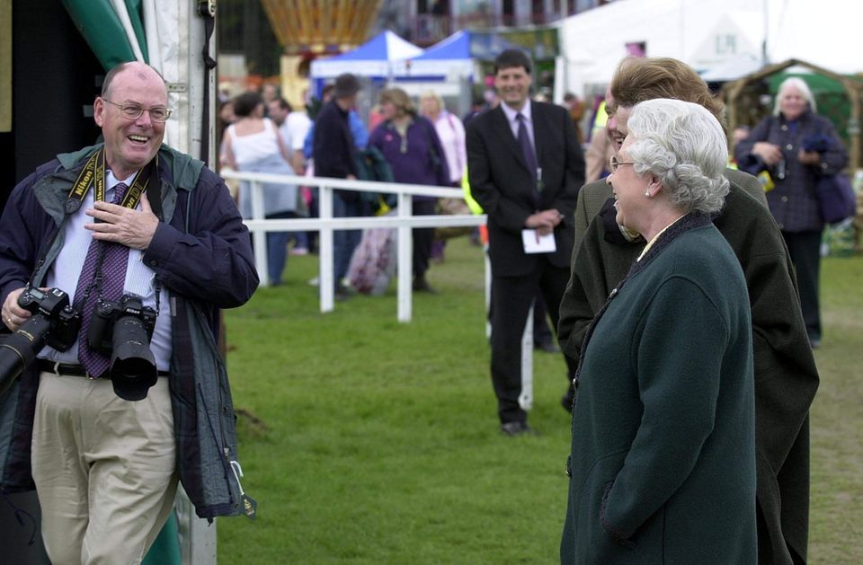 Photographer Edwards and the Queen meet on the sidelines of a horse race Photographer Edwards and the Queen meet on the sidelines of a horse race